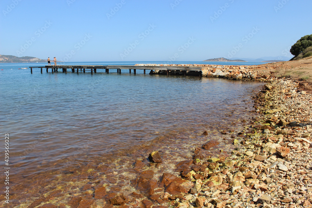 pier on shores of  Aegean Sea