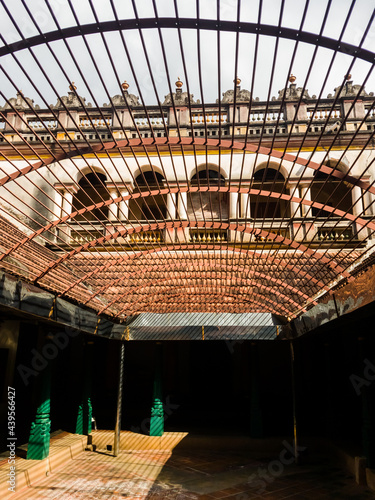 An open grilled roof above a courtyard in an old heritage house in a village in Chettinad. photo