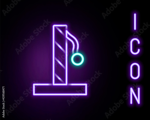 Glowing neon line Cat scratching post with toy icon isolated on black background. Colorful outline concept. Vector