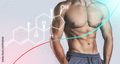 Muscular male torso and testosterone formula. Concept of hormone increasing methods. photo