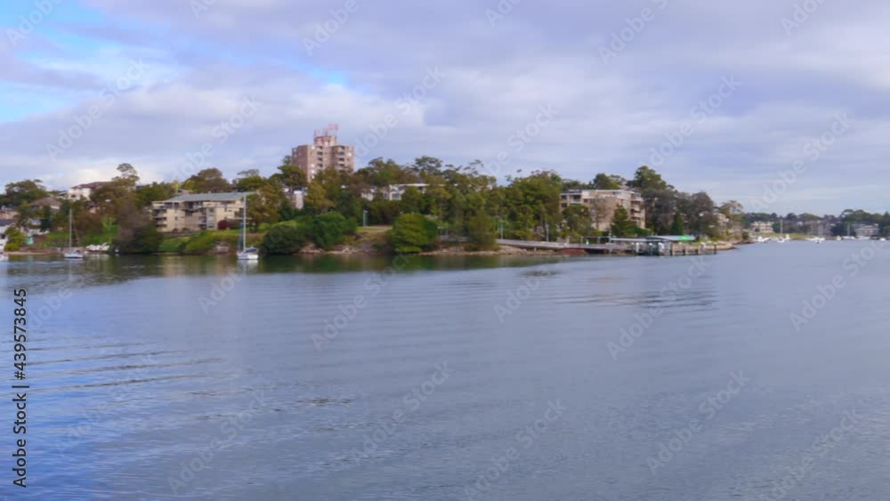 Parramatta river at Gladvesville with residential housing in the background Sydney NSW Australia Parramatta river at Gladvesville with residential housing in the background Sydney NSW Australia