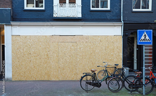 boarded up store window