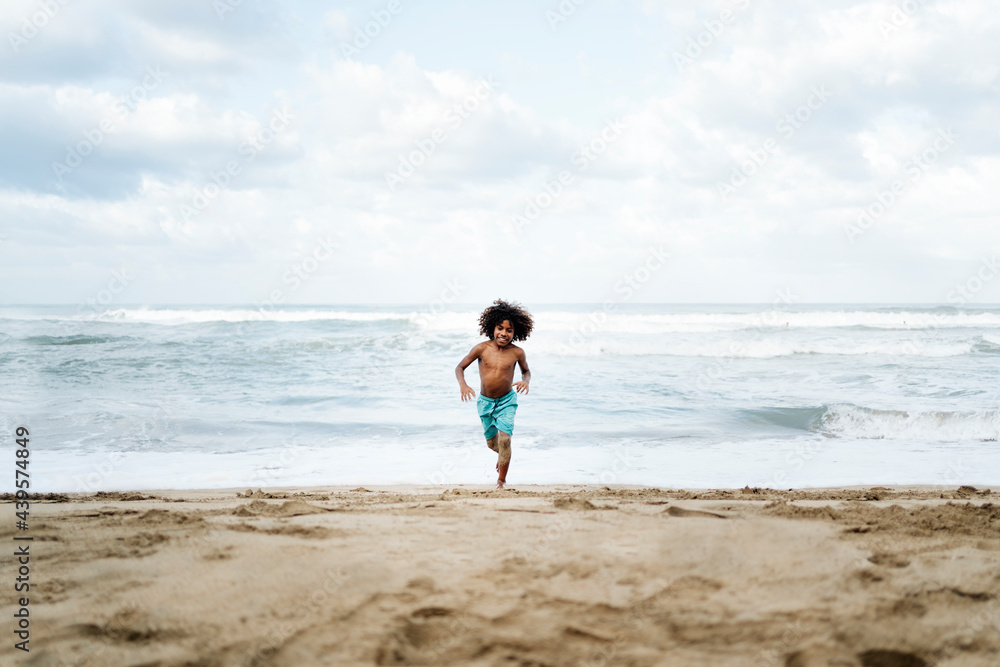 Happy African Boy in the Beach