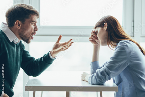 young couple in a cafe emotions dispute conflict quarrel