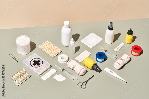 Set of first aid supplies on table