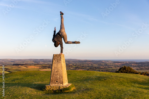 Woman in handstand photo