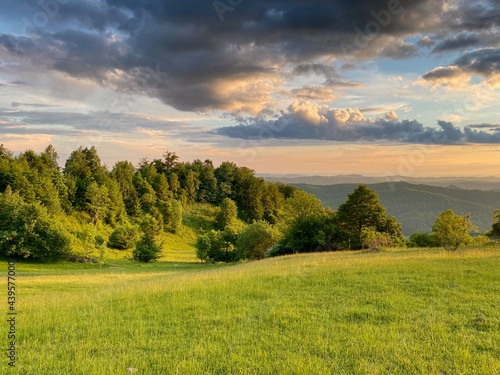 Epic clouds and beautiful evening sunset over the hills in Romania