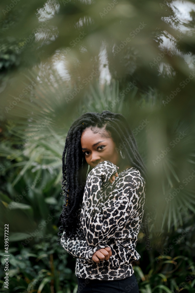 Beautiful Black woman in the garden Beautiful Black woman in the garden