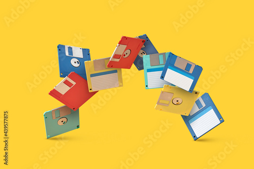 Colored vintage floppy discs in fall photo