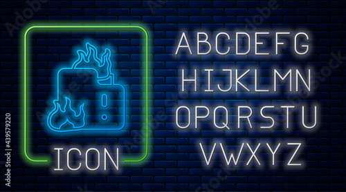 Glowing neon Fire in burning house icon isolated on brick wall background. Neon light alphabet. Vector