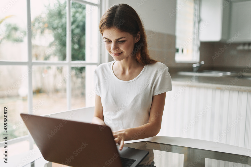 woman at home in front of laptop work professional freelance woman at home in front of laptop work professional freelance