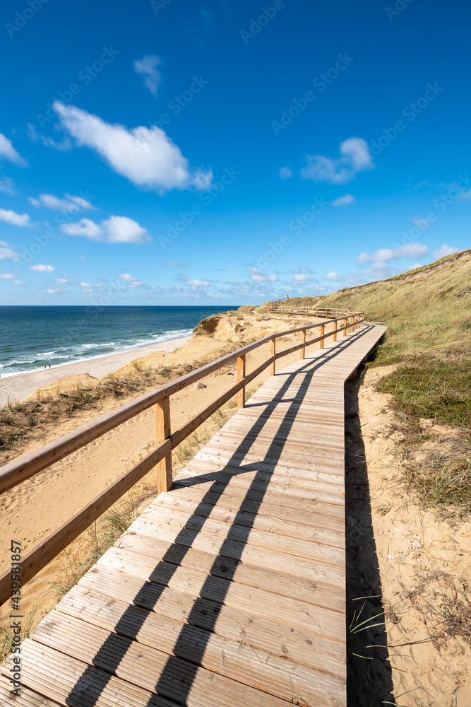 Wooden boardwalk along the Rotes Kliff, Sylt, Schleswig-Holstein, Germany Wooden boardwalk along the Rotes Kliff, Sylt, Schleswig-Holstein, Germany