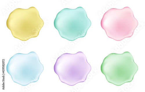 Dripping pink, golden, green, blue creamy liquid.
