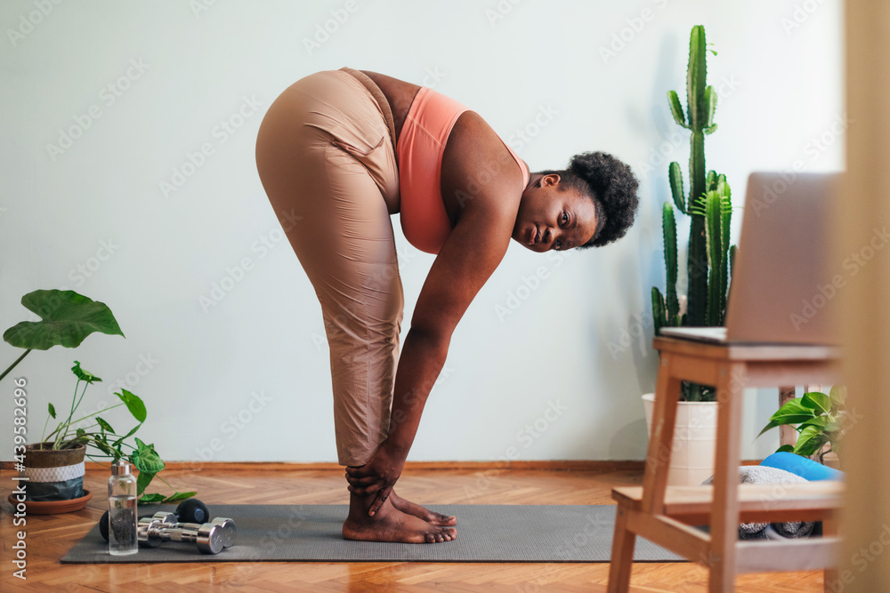 Woman Stretching at Home