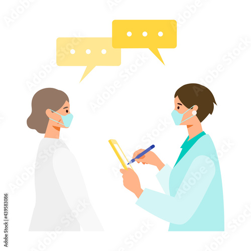 ワクチン摂取前の予診を受ける女性