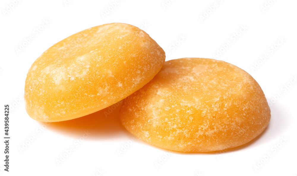 two cakes of palm sugar isolated on white background