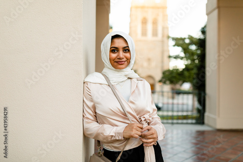 Attractive Muslim Woman Smiles at Camera photo