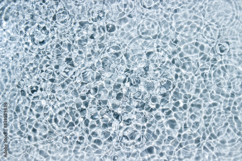 Obraz premium Circle ripples on water surface. Ripples on the water background. Pure clear water