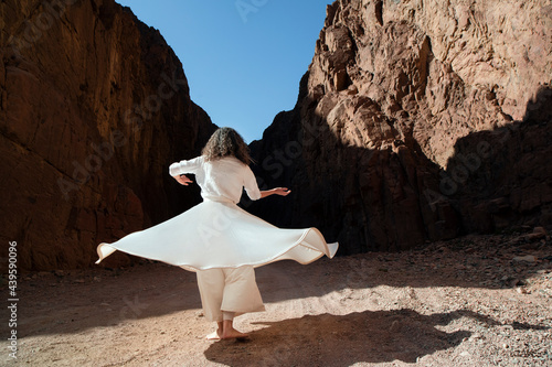 Sufi dance inside canyon 
