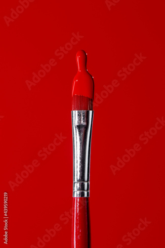 red paint in a red paintbrush