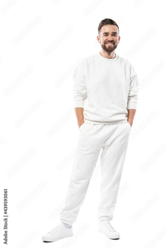 Handsome man wearing blank white clothes on white background Handsome man wearing blank white clothes on white background