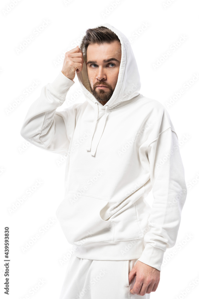 Handsome man wearing blank white hoodie on white background Handsome man wearing blank white hoodie on white background