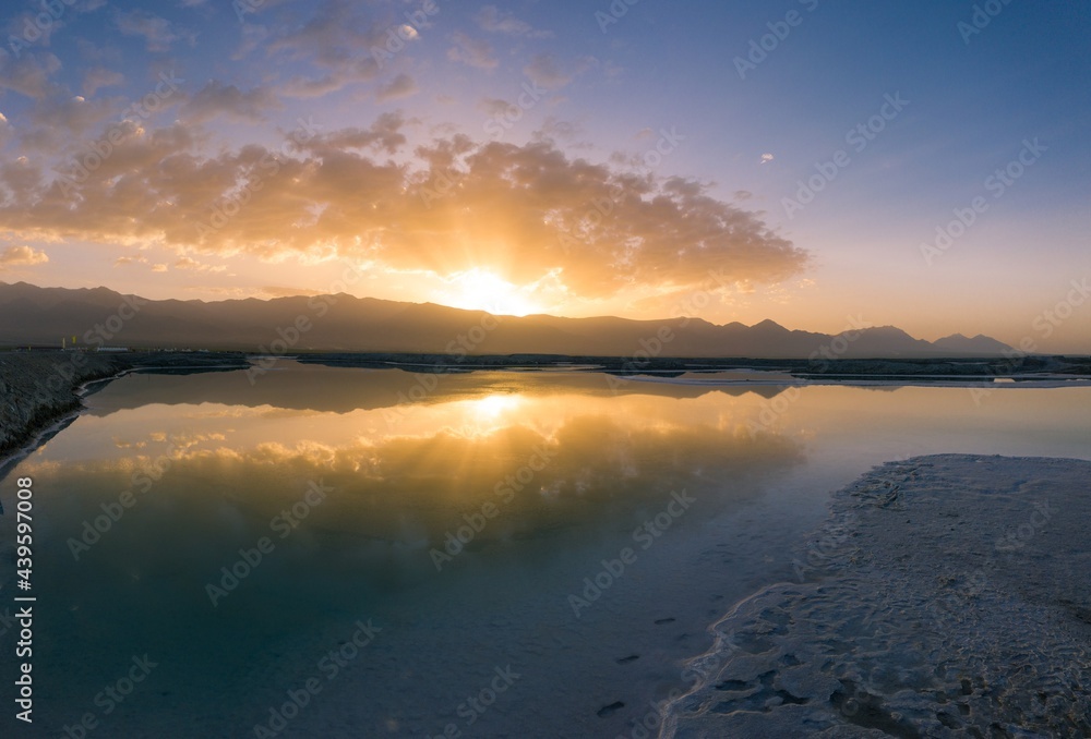 Beautiful sunrise over feicui lake in Qinghai province in China.