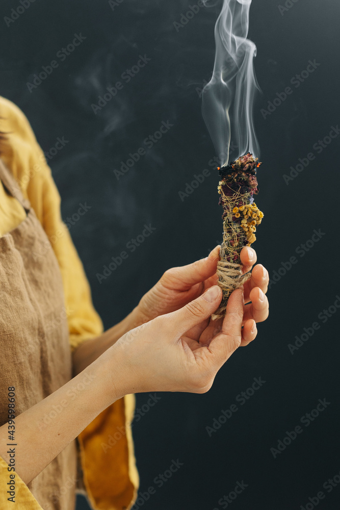 © Nastia Vesna/Stocksy - Smudge stick © Nastia Vesna/Stocksy - Smudge stick