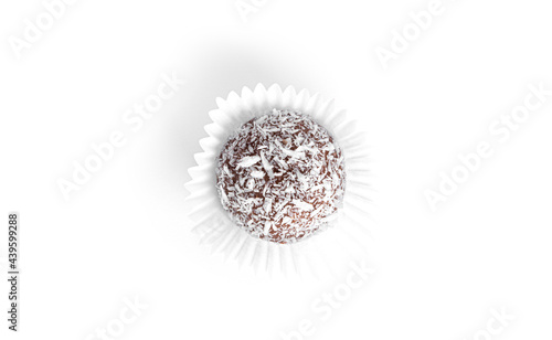 Chocolate candy truffle with coconut isolated on a white background.