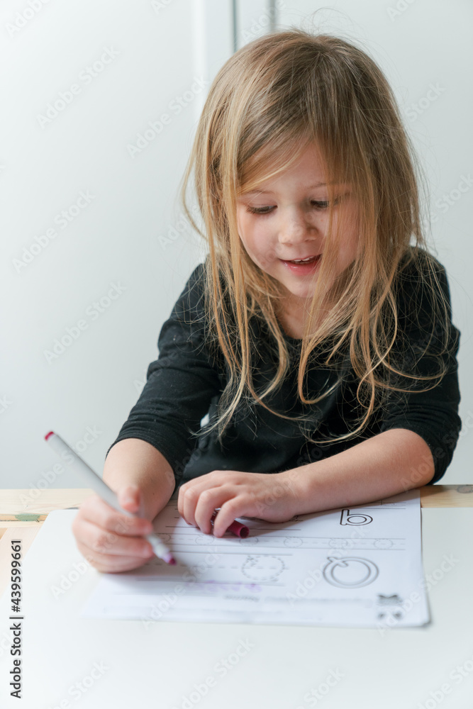 young preschool girl practices writing young preschool girl practices writing