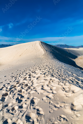 dramatic desert landscape of white sand dunes in New Mexico