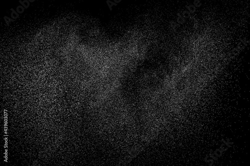 Distressed white grainy texture. Dust overlay textured. Grain noise particles. Snow effects pack. Rusted black background. Vector illustration, EPS 10.