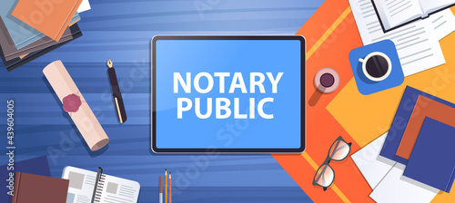 notary workplace with legacy stamp sealed document legal trust and public pen near tablet pc signing and legalization documents