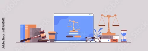 Obraz law and justice concept gavel judge books and scales on laptop screen online lawyer legal advice