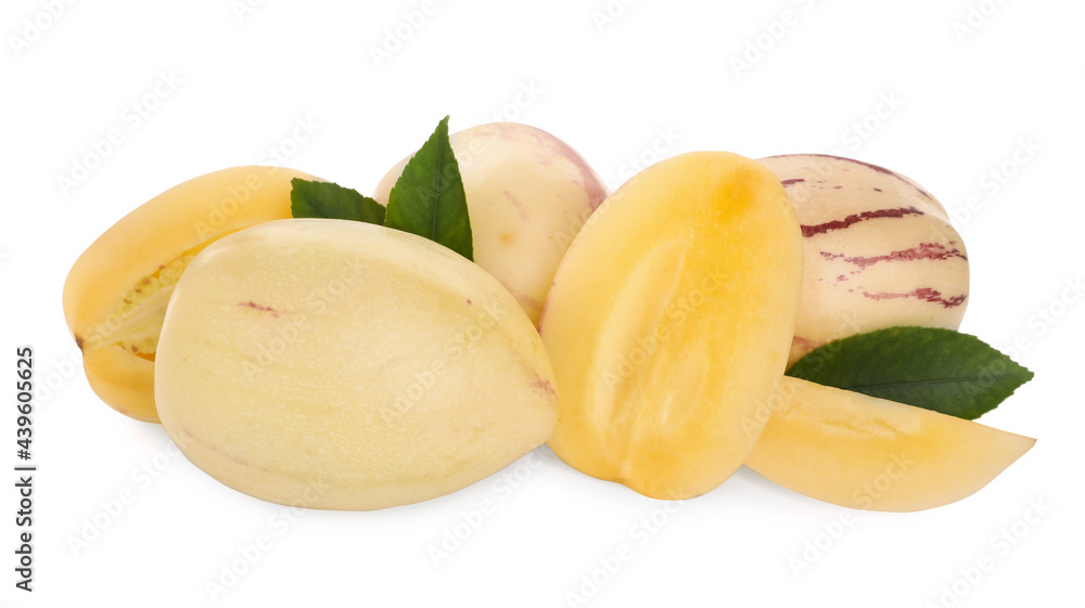 Whole and cut pepino melons with green leaves isolated on white Whole and cut pepino melons with green leaves isolated on white