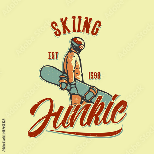 T-shirt design slogan typography skiing junkie est 1998 with skiing man carrying snow board