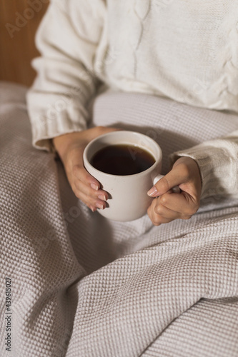 Person holding hot drink coffee 