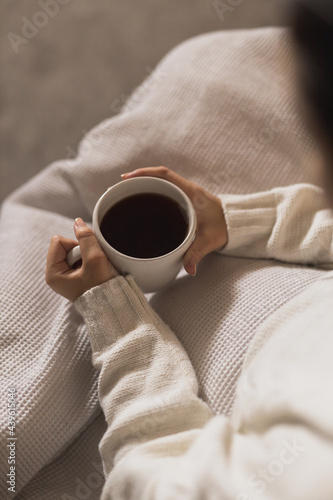 Person holding hot drink coffee 