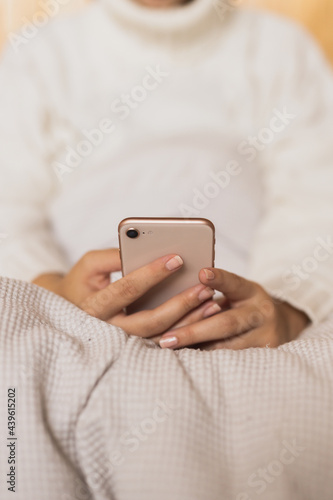 close up of a person holding a smartphone
