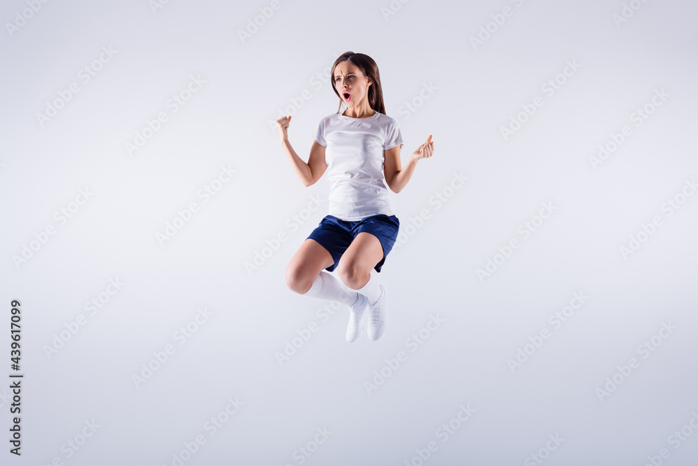 Full length body size view of her she nice-looking attractive pretty slim satisfied straight-haired girl jumping rejoicing having fun final isolated over light white gray pastel color background Full length body size view of her she nice-looking attractive pretty slim satisfied straight-haired girl jumping rejoicing having fun final isolated over light white gray pastel color background