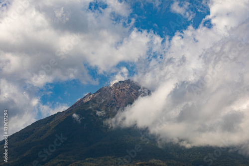 Photograph of massive cloud-covered Ebulobo volcano, Nagekeo Regency, East Nusa Tenggara, Flores, Indonesia photo