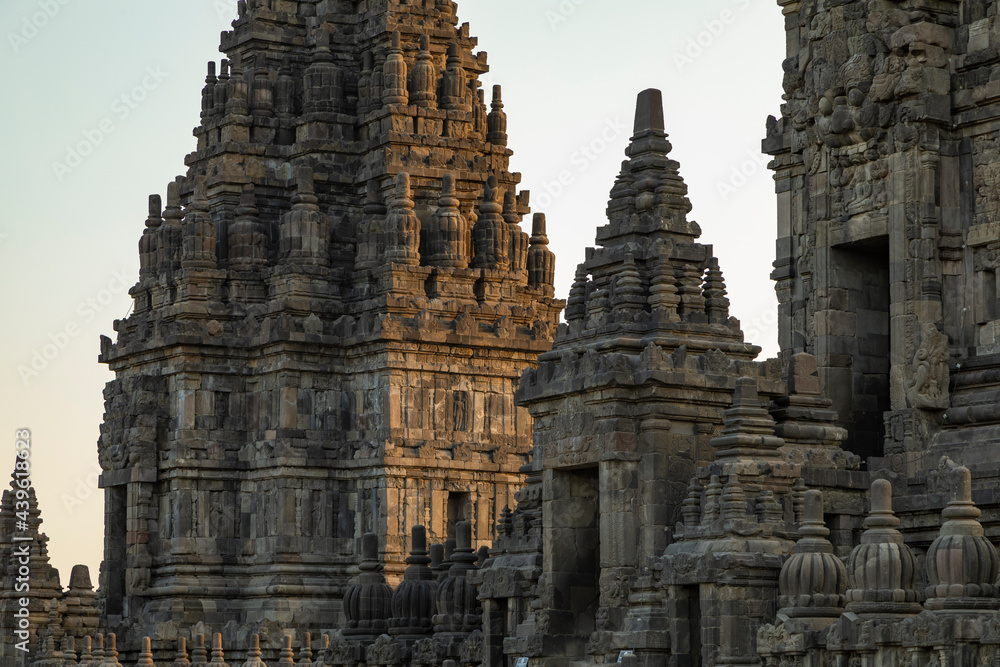 Close-up of the Prambanan ancient Hindu temples, empty at sunset, remain silent, after the departure of tourists, Central Java, Indonesia