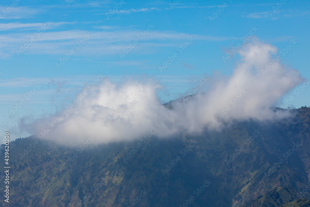 Obraz premium Bromo mountains and natural landscape, part of the Tengger massif, seen from Cemoro Lawang village, in East Java province, Indonesia