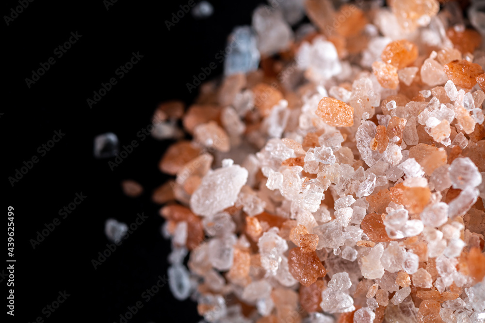 Closeup of Himalayan salt with pinkish , white and transparent crystals used for preparation of tasty meals and other purposes. Closeup of Himalayan salt with pinkish , white and transparent crystals used for preparation of tasty meals and other purposes.