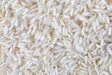 Jasmine rice,Top view of white rice seed texture background. Organic, natural long rice grain