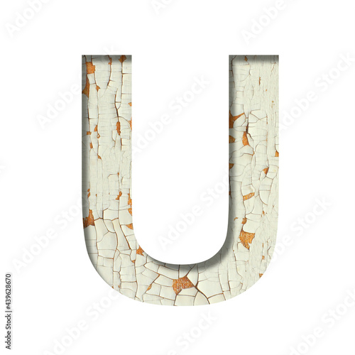 Rustic font. The letter U cut out of paper on the background of old rustic wall with peeling paint and cracks. Set of simple decorative fonts