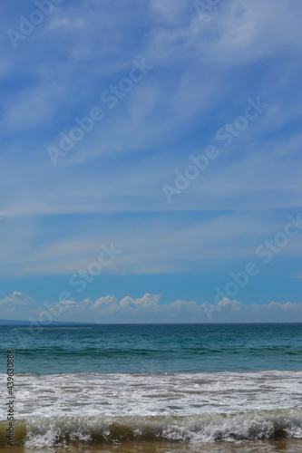 summer sea waves on the beach with blue sky © itsuky