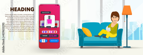 The girl is sitting on the couch with a mobile phone in her hand and makes online purchases of cosmetics