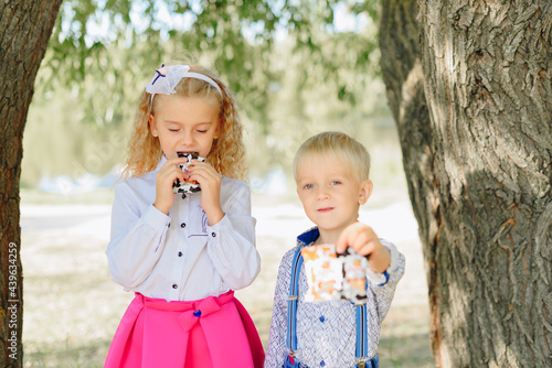 Children with candy in their hands photo