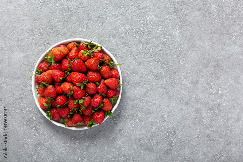 Eco friendly strawberries on gray background with copy space